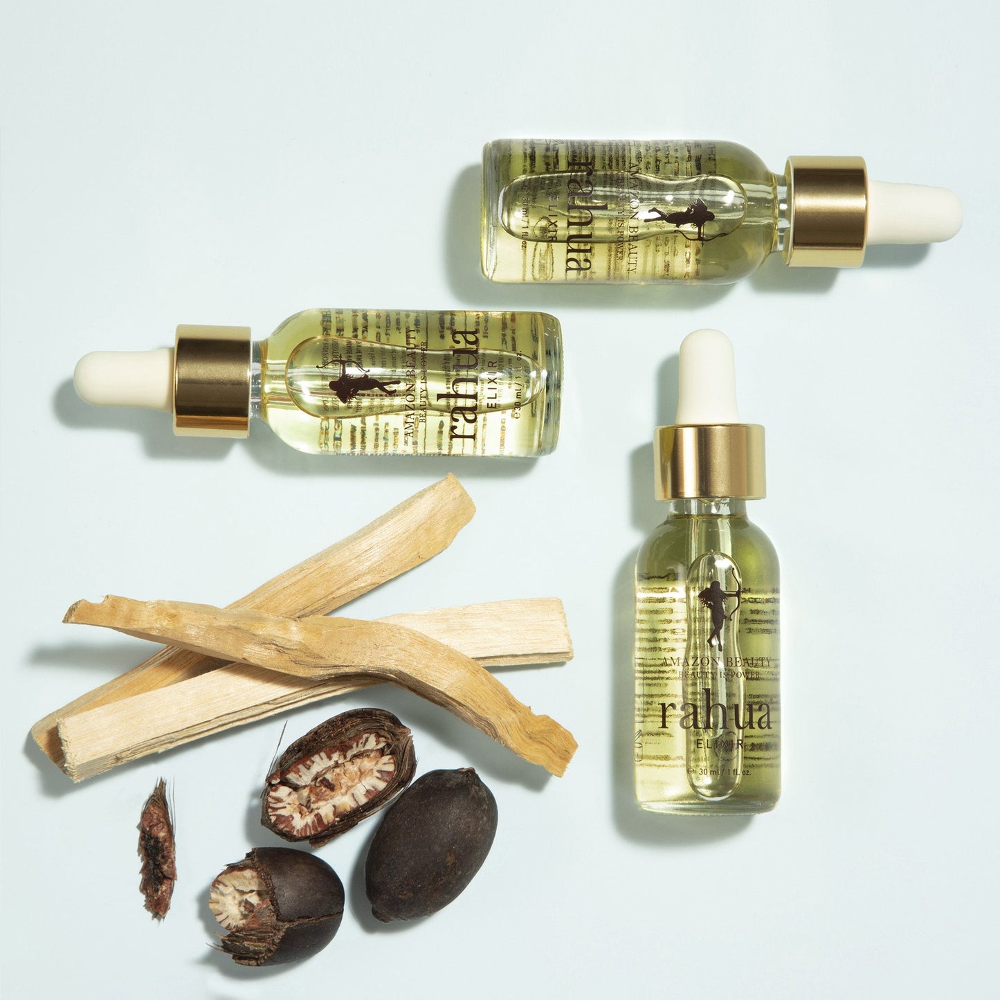 Three Rahua Elixir Bottles with Rahua Seeds (Ungurahua) and Palo Santo Sticks