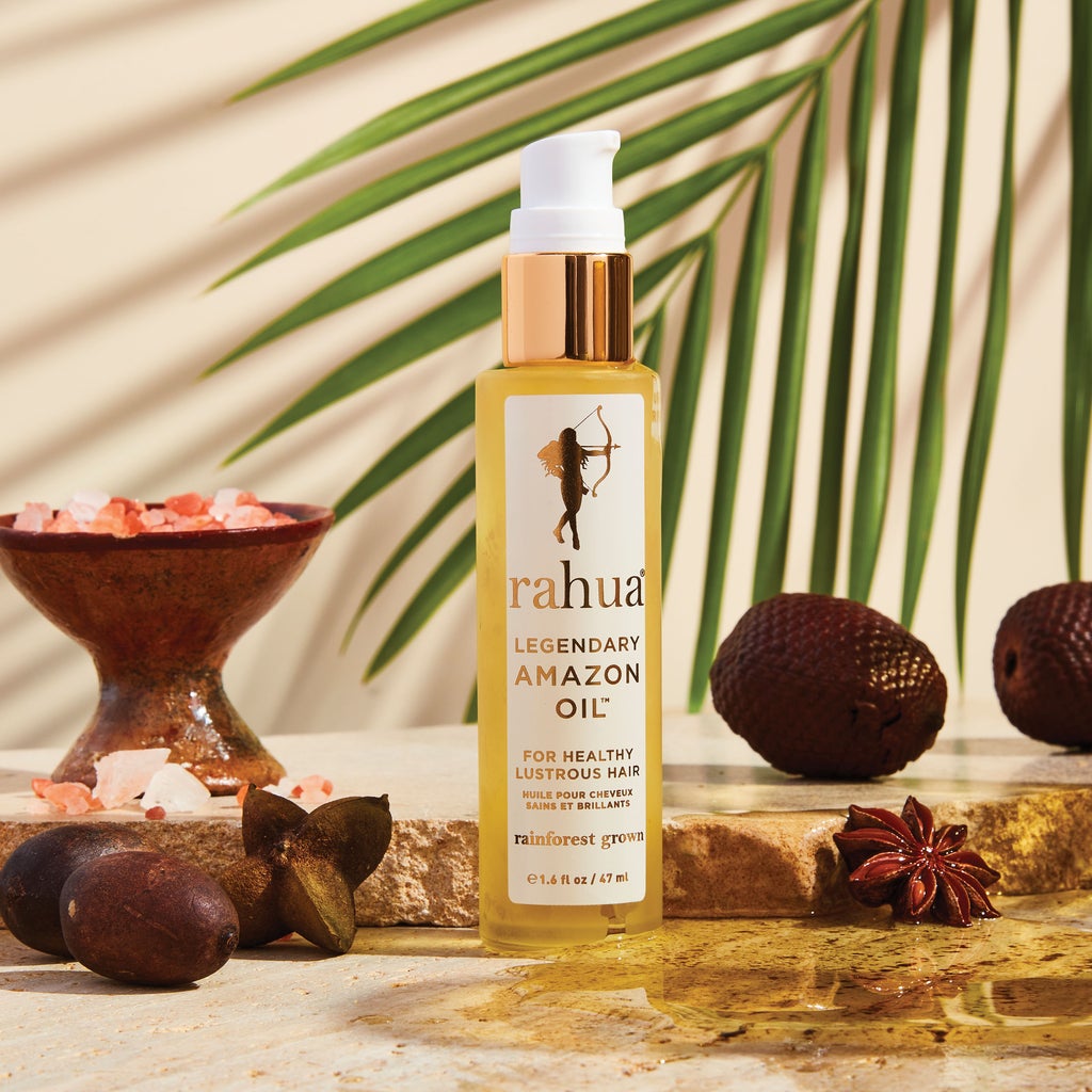 Rahua legendary amazon oil with hibiscus flower and natural oil with marble block